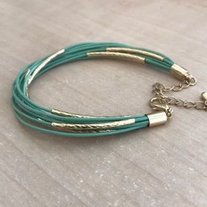 Turquoise and gold-colored bracelet